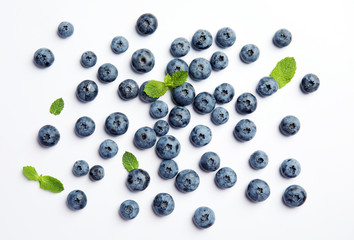 Flat lay composition with tasty blueberry on white background