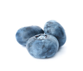 Tasty juicy ripe blueberries on white background