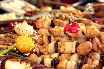 Grilled vegetables and meat at the fair.