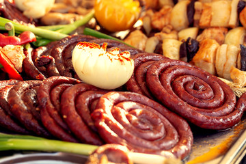 Grilled vegetables and meat at the fair.
