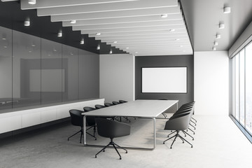 Modern concrete meeting room with poster