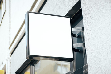 Empty square white billboard