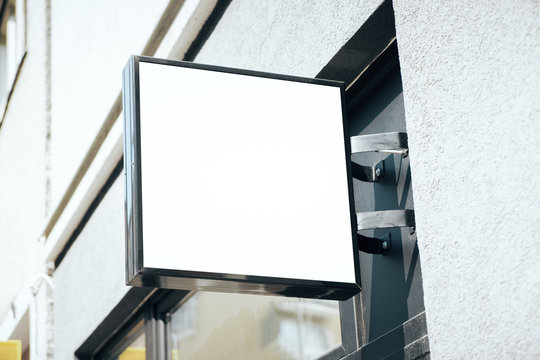 Empty square white billboard