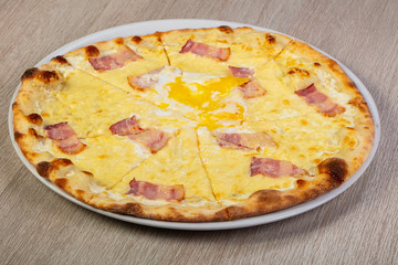 Pizza carbonara with bacon