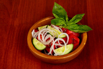 Salad with tomato and cucumbers