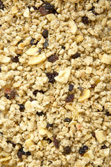 Muesli and dried fruits, overhead view. Top view, from above.
