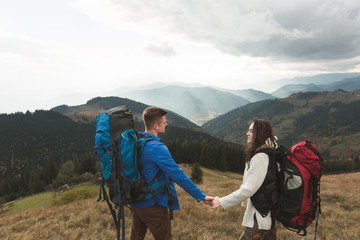 Fototapeta premium Couple in the mountains tourist
