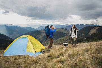 Fototapeta premium Couple in the mountains tourist
