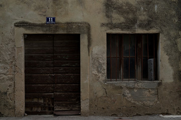 old wall with a door and a window in Croatia