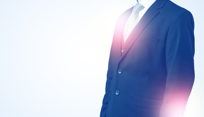 Young businessman standing and thinking without head  