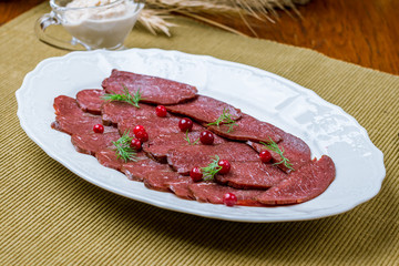 sliced dry-cured venison