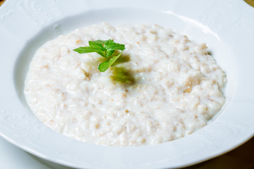 oatmeal porridge on white plate
