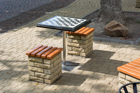 Chess table and benches in the park