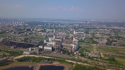 Beautiful panoramic drone shot of the factory near the city