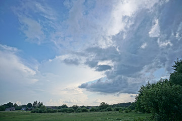 Beautiful evening landscape already with dark trees. Autumnal summer background for design