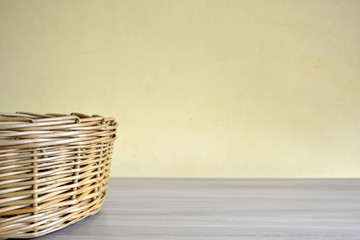 empty wicker basket on light background storage basket