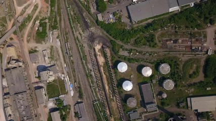 Aerial drone shot of big factory near the city
