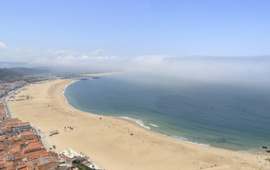 Scenic view of Nazare beach. Coastline of Atlantic ocean. Portuguese seaside town on Silver coast....