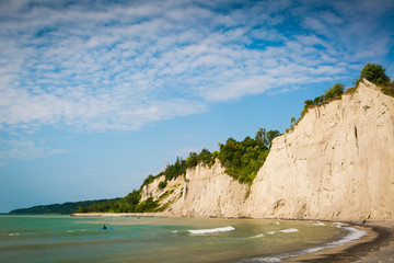 Bay and cliffs landscape on a sunny summer day