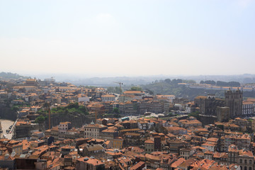 Fototapeta premium Scenic view of Porto, Portugal from the tower Clérigos Church. Orange roofs of the houses.