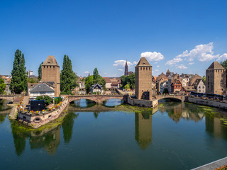 Fototapeta na wymiar The Towers of Ponts Couverts in Strasbourg. Strasbourg is the capital and largest city of the Grand Est region of France and is the official seat of the European Parliament.