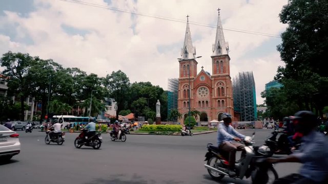 Timelapse of Notre Dame Cathedral (Vietnamese: Nha Tho Duc Ba). Royalty high quality free stock footage time lapse of Notre-Dame Cathedral Basilica of Saigon officially Cathedral Basilica of Our Lady