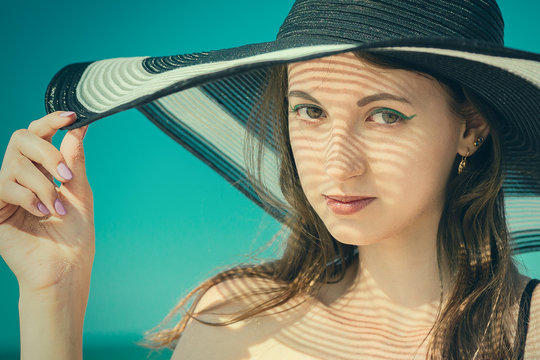 woman in hat