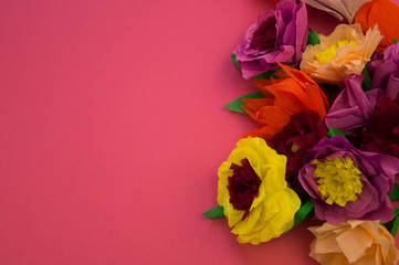 making crepe paper flowers on pink background