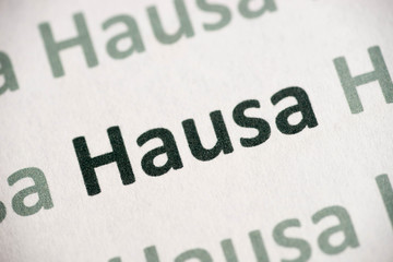 word Hausa language printed on paper macro