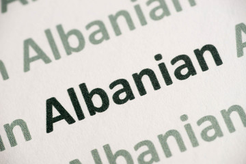 word Albanian language printed on paper macro