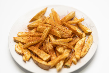 French fries with salt and paprika