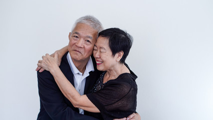 Happy smile Asian elderly couple in business attire, SME owner