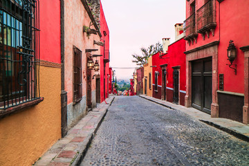 red tone houses between street in the old town.