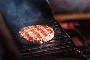 Close-up grill cook fresh burger hamburger cutlets from meat beef