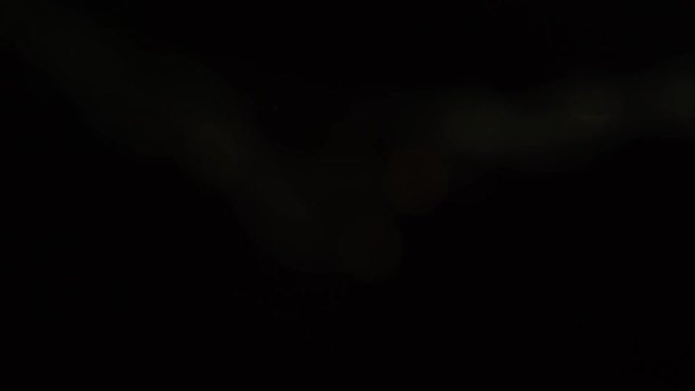 4k Out focus of light bulb celebrating party with random beat in a black backgroud