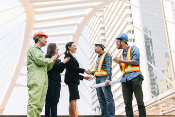 Engineers group and worker meeting handshake with business owners after receiving a great deal.