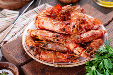 Tasty grilled shrimps or prawns on a plate