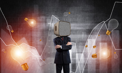 Businessman with monitor old TV instead of head.