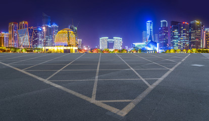 Urban road asphalt pavement and skyline of Hangzhou architectural landscape
