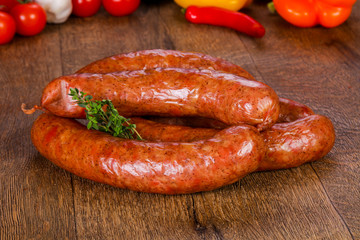Pork sausages over wooden
