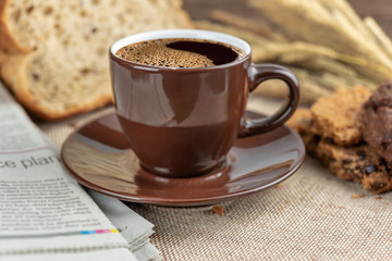 Hot coffee cup and breakfast