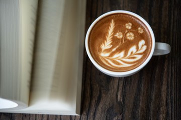 Top view latte art coffee cup.