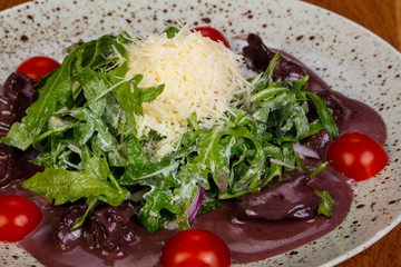 Liver salad with rucola