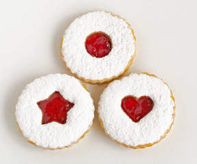 Linzer cookies on white background,top view