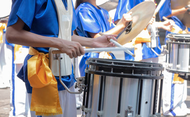 Closeup of group of boy and girl in Thai traditional uniform with drums. , snare drum