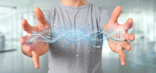 Businessman holding a 3d render DNA