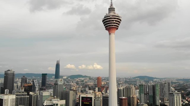 aerial right sweep of KL tower and skyline