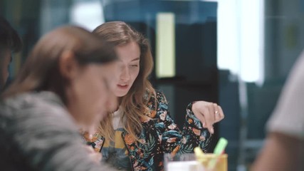 The creative team is discussing a new project. Hot discussions. - Powered by Adobe