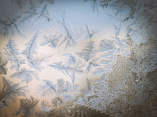 Winter Season Fantasy World Theme Concept: Macro Image Of Colorful Light Frosty Window Glass...