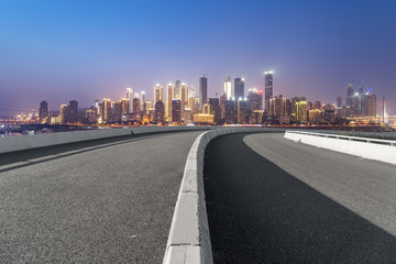 Obraz premium Road surface and skyline of Chongqing urban construction